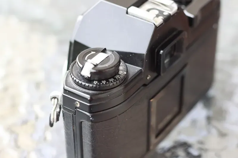 Nikon EM top left