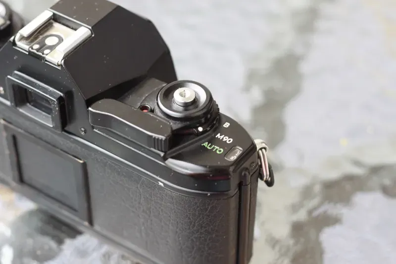 Nikon EM top
